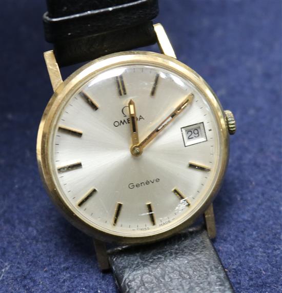 A gentlemans gold Omega manual wind wrist watch.